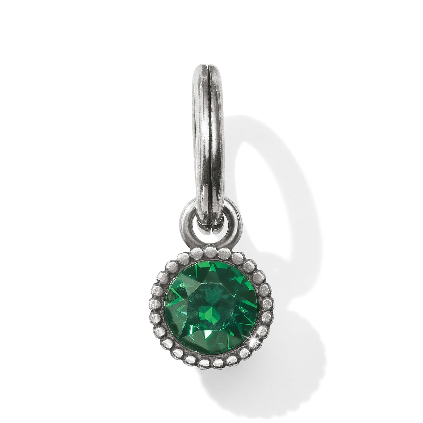 Brighton charm with round green crystal, beaded silver-tone frame, and split ring clasp on a white background