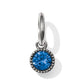 Brighton charm with round blue crystal and silver-tone beaded border on a hinged ring on a white background