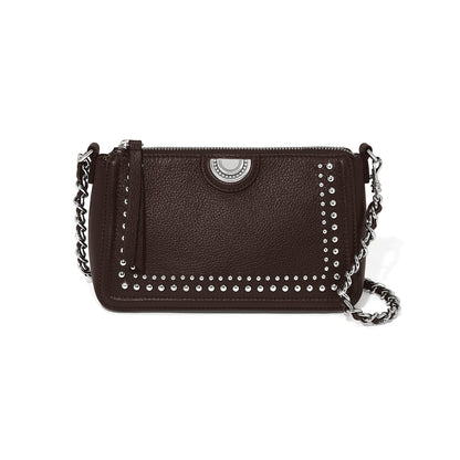Brighton dark brown leather crossbody handbag with silver-tone studs and braided chain strap on a white background