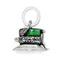 Brighton charm shaped like a top hat with green enamel band and silver-plated scroll detailing on a white background
