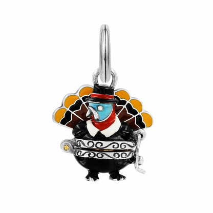 Brighton turkey charm with black, orange, and brown enamel feathers, silver-plated top hat detail on a white background