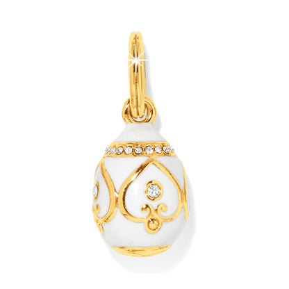 Brighton egg-shaped charm pendant with white enamel, gold-plated scrollwork, and crystal accents on a white background