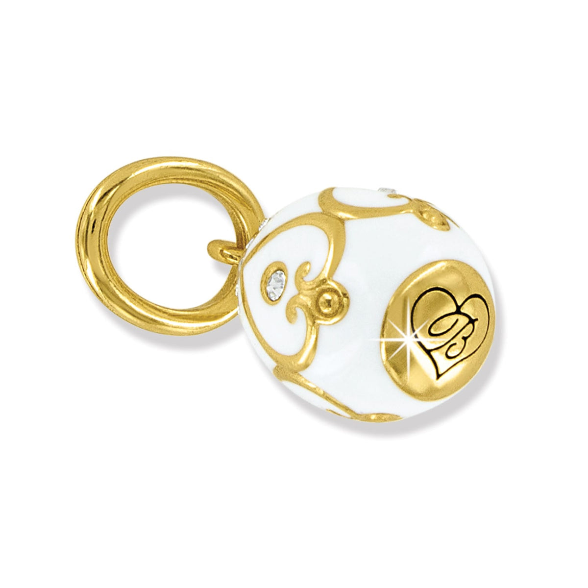 Brighton gold-plated charm with white enamel, scrollwork detail, heart emblem, and crystal accents on a white background