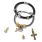 Brighton bracelets styled with gold-plated crystal charms and cross pendants on a white background
