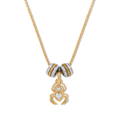 Brighton gold-plated charm necklace with crystal spider pendant and two crystal enamel bead rings on a white background