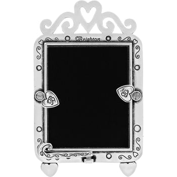 Brighton silver-plated picture frame with heart cutouts, scrollwork detail, and ornate crown top on a white background