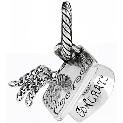 Brighton silver-plated charm shaped like a cake with candle and Congrats engraving on a white background