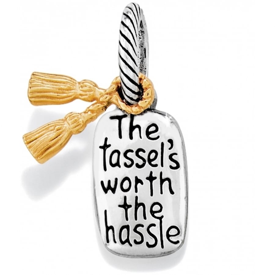 Brighton charm with silver-tone tag reading The tassel's worth the hassle and gold-tone tassel on a white background