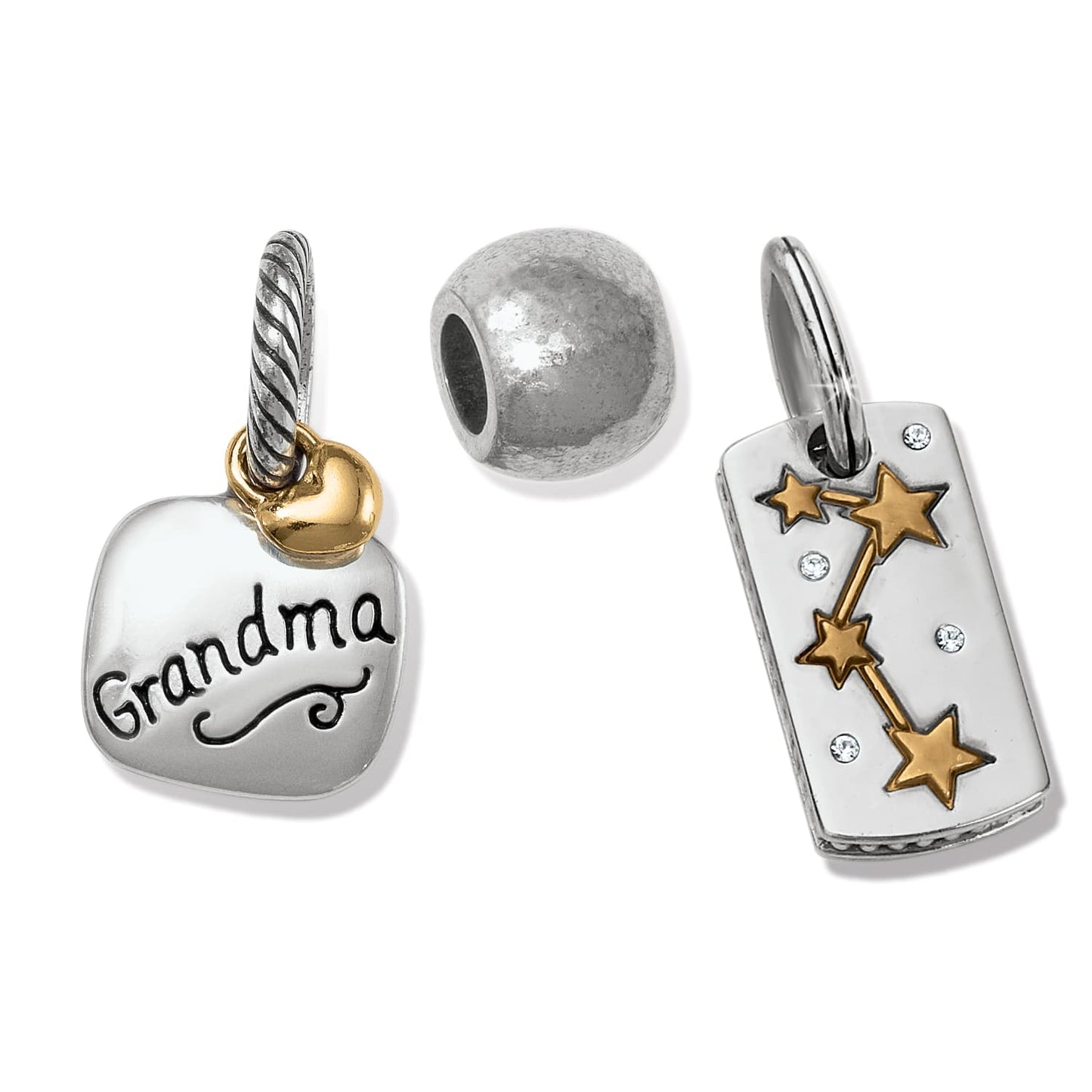 Brighton silver-plated charms featuring a Grandma heart charm, round bead, and gold star constellation tag on a white background