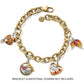 Brighton two tone charm bracelet with enamel squirrel, autumn leaf, heart, and blessings charms on a white background