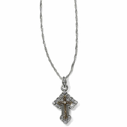 Brighton pendant necklace with two-tone cross featuring crystal accents and gold scrollwork on a white background