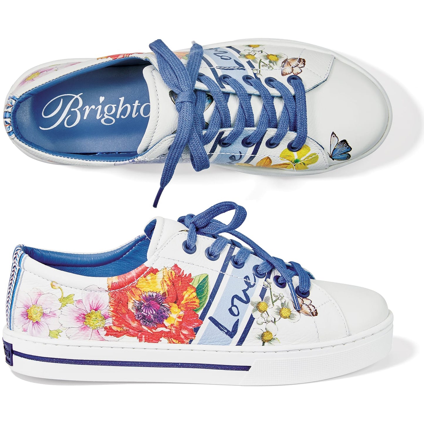 Brighton white leather sneakers with floral print, blue laces, and blue interior lining on a white background