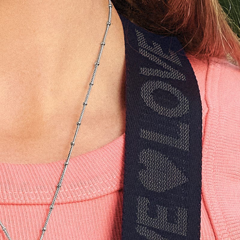 photo of the strap with the word love woven in