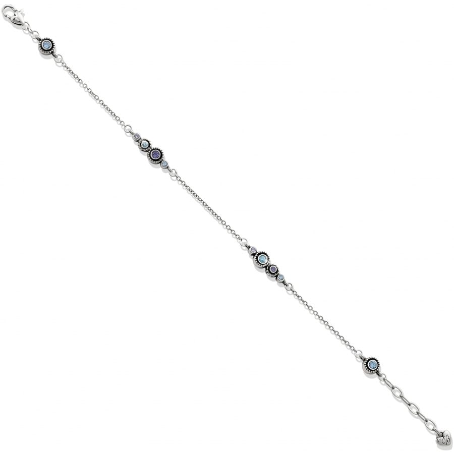 Brighton silver-plated bracelet with clustered blue crystal stations and delicate chain links on a white background