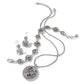 Brighton silver-plated necklace, bracelet, and earrings set styled together with multicolored crystal accents on a white background