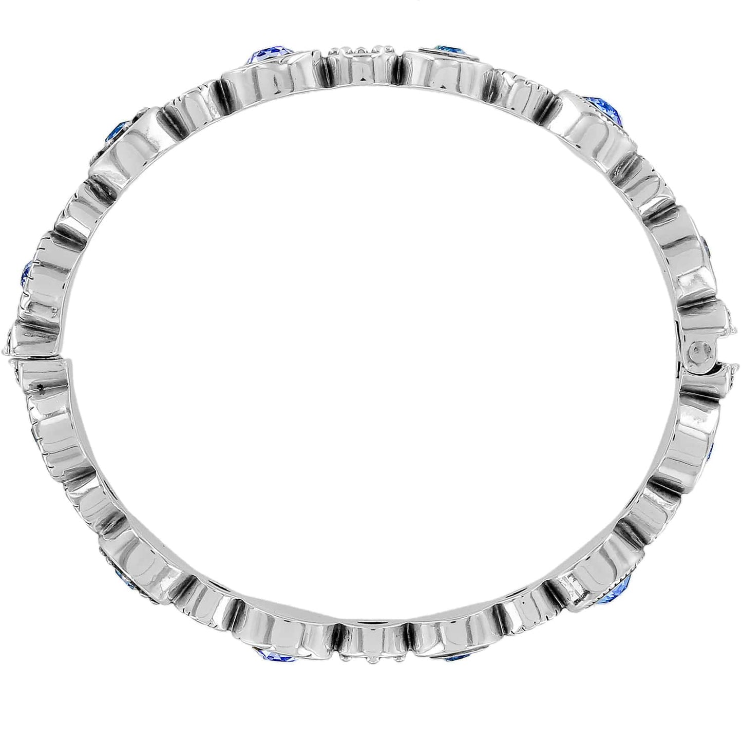 Brighton bangle bracelet shown from the side with silver-plated textured band and blue crystal accents on a white background