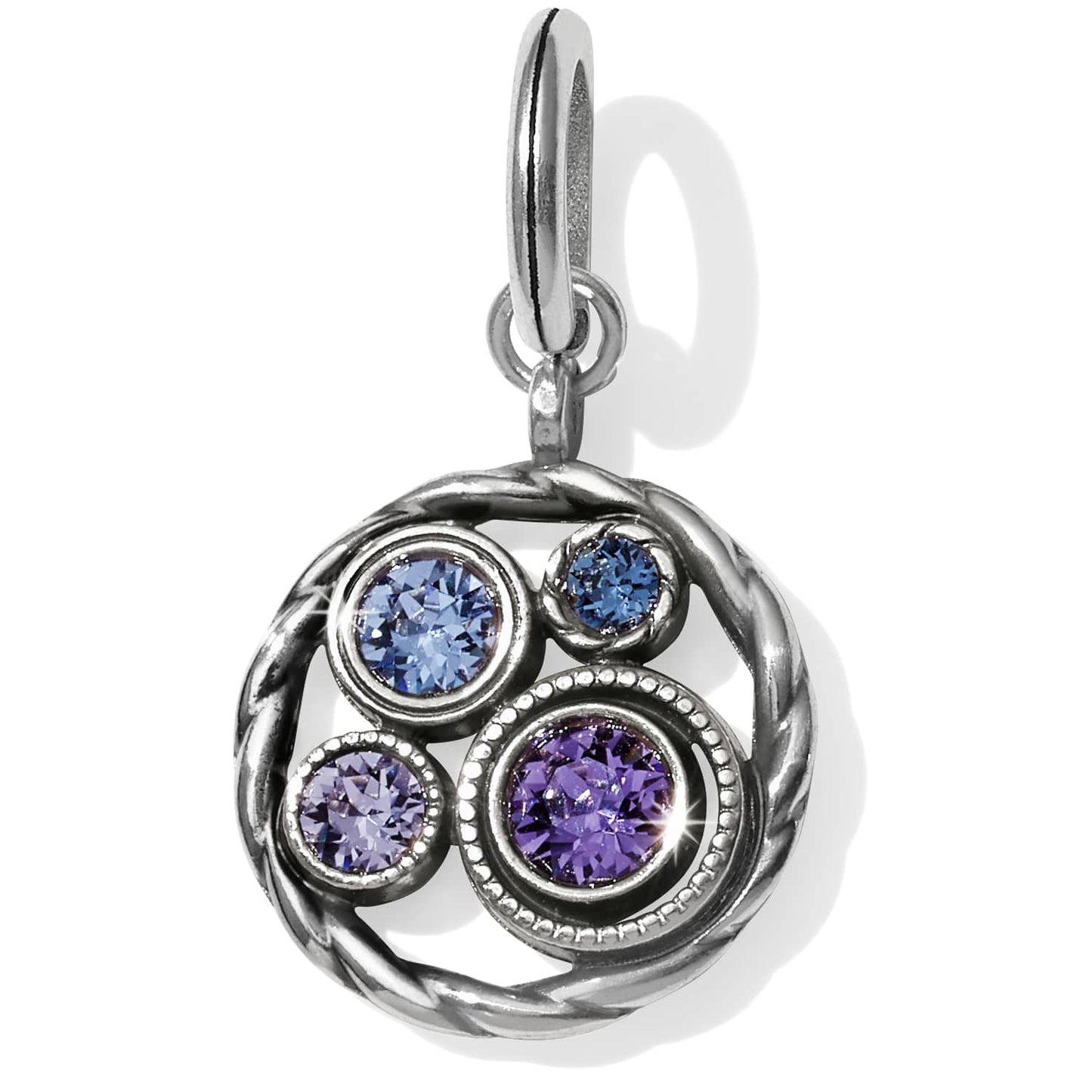 Brighton charm with blue and purple crystals in silver-plated braided circular frame on a white background