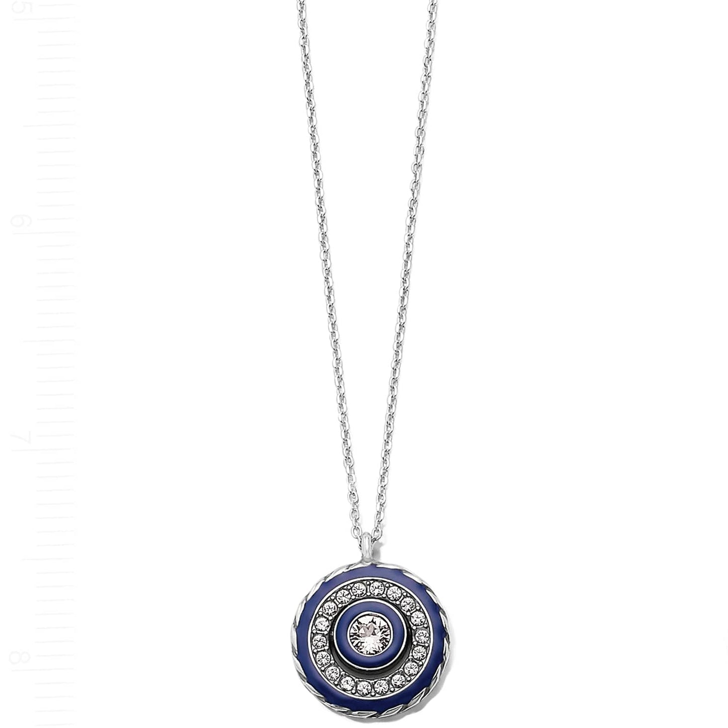 Brighton pendant necklace with blue enamel border, crystal ring, and central crystal on silver-plated chain, on a white background