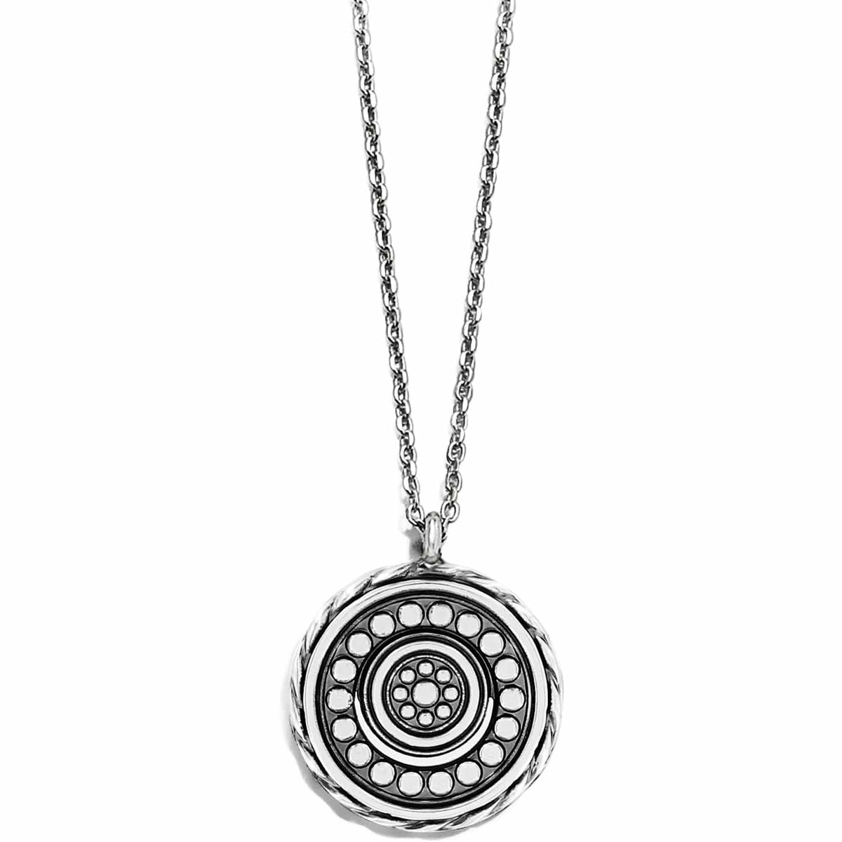 Brighton pendant necklace with silver-plated round medallion featuring concentric beaded circles and rope border on a white background
