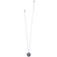 Brighton pendant necklace with silver-plated chain and round blue enamel pendant with crystal accents on a white background