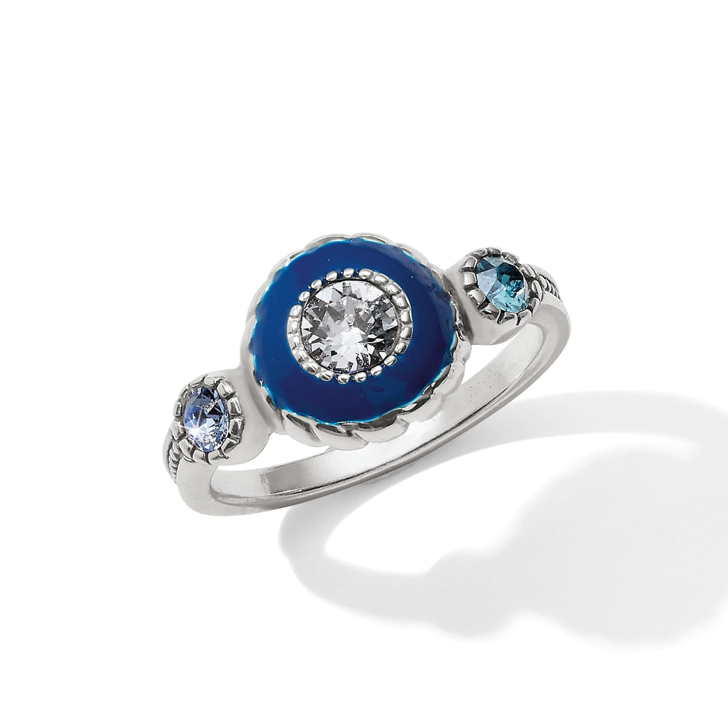Brighton silver-plated ring with round blue enamel center, clear crystal, and light blue crystal accents on a white background