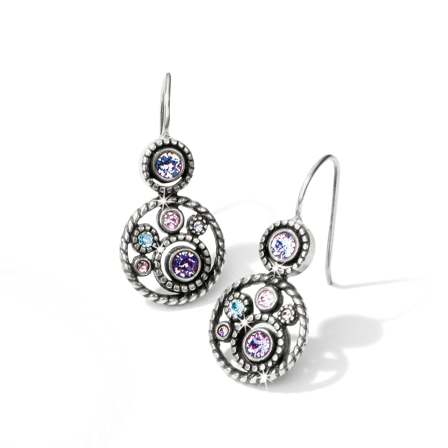 Brighton drop earrings with purple, pink, and blue crystals in silver-plated openwork circles on a white background