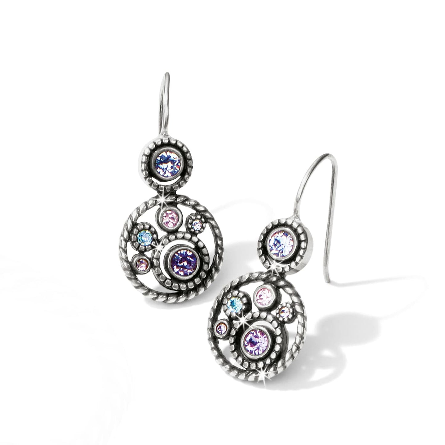 Brighton drop earrings with purple, pink, and blue crystals in silver-plated openwork circles on a white background