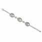 Brighton bracelet with three circular stations, crystal accents, two-tone finish, and lobster clasp on a white background