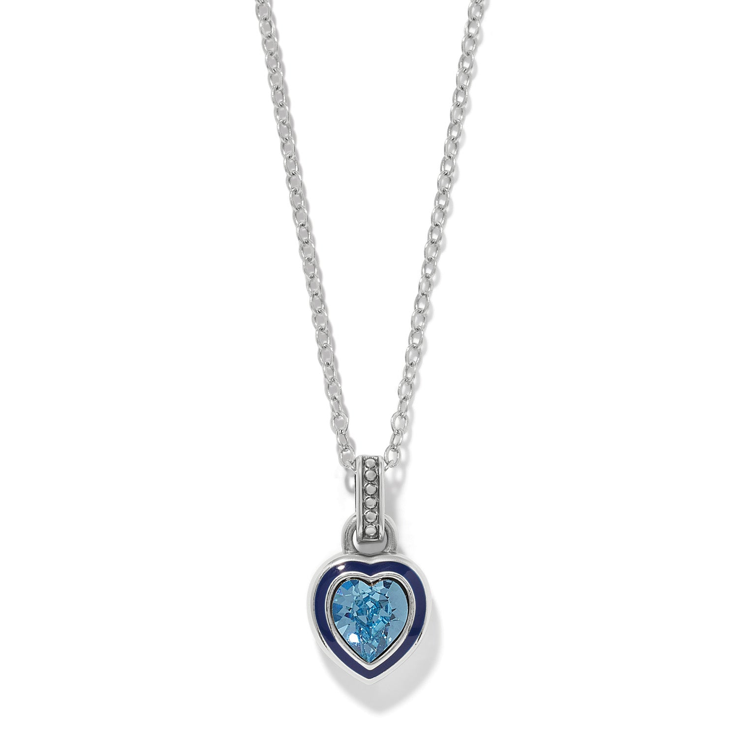 Brighton pendant necklace with blue crystal heart, navy enamel border, and silver-plated chain on a white background