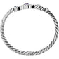 Brighton silver-plated ring with twisted rope band and multicolored crystal accents, side view, on a white background