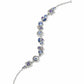 Brighton bracelet with blue, purple, and pink crystals in round and square silver-plated stations on a white background