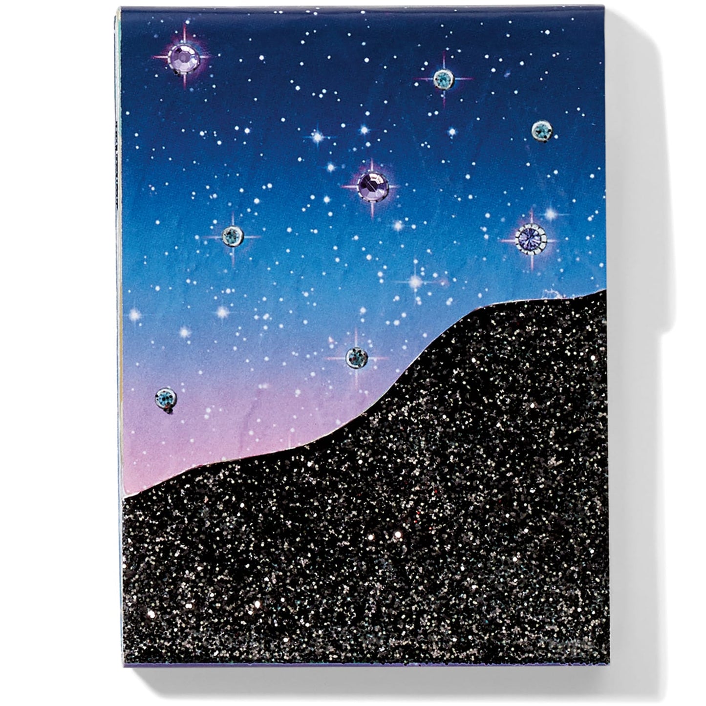 Brighton notebook with starry night sky design, crystal star accents, and black glitter hillside on a white background