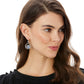 Model wearing Brighton silver-plated drop earrings with circular frames and blue crystal cluster accents