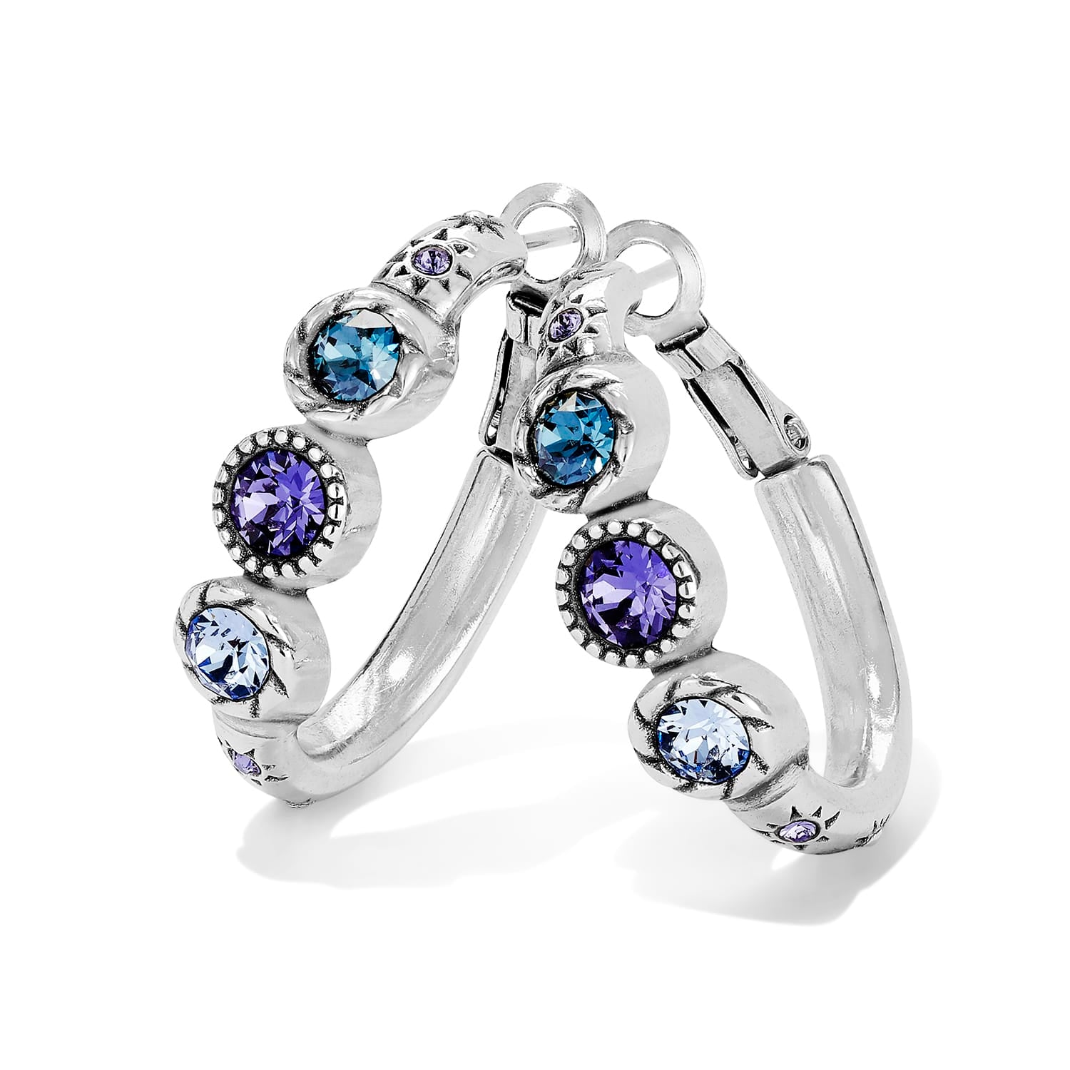 Brighton silver-plated hoop earrings with blue and purple crystals in beaded bezel settings on a white background