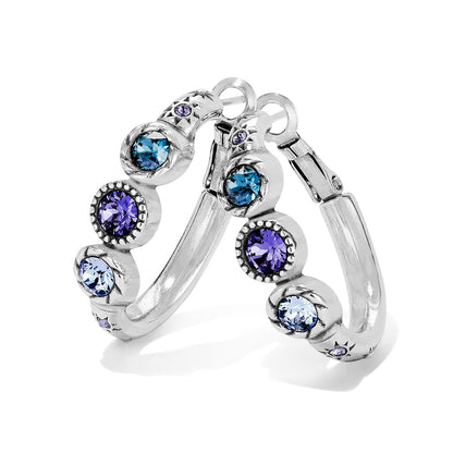 Brighton silver-plated hoop earrings with blue and purple crystals in beaded bezel settings on a white background