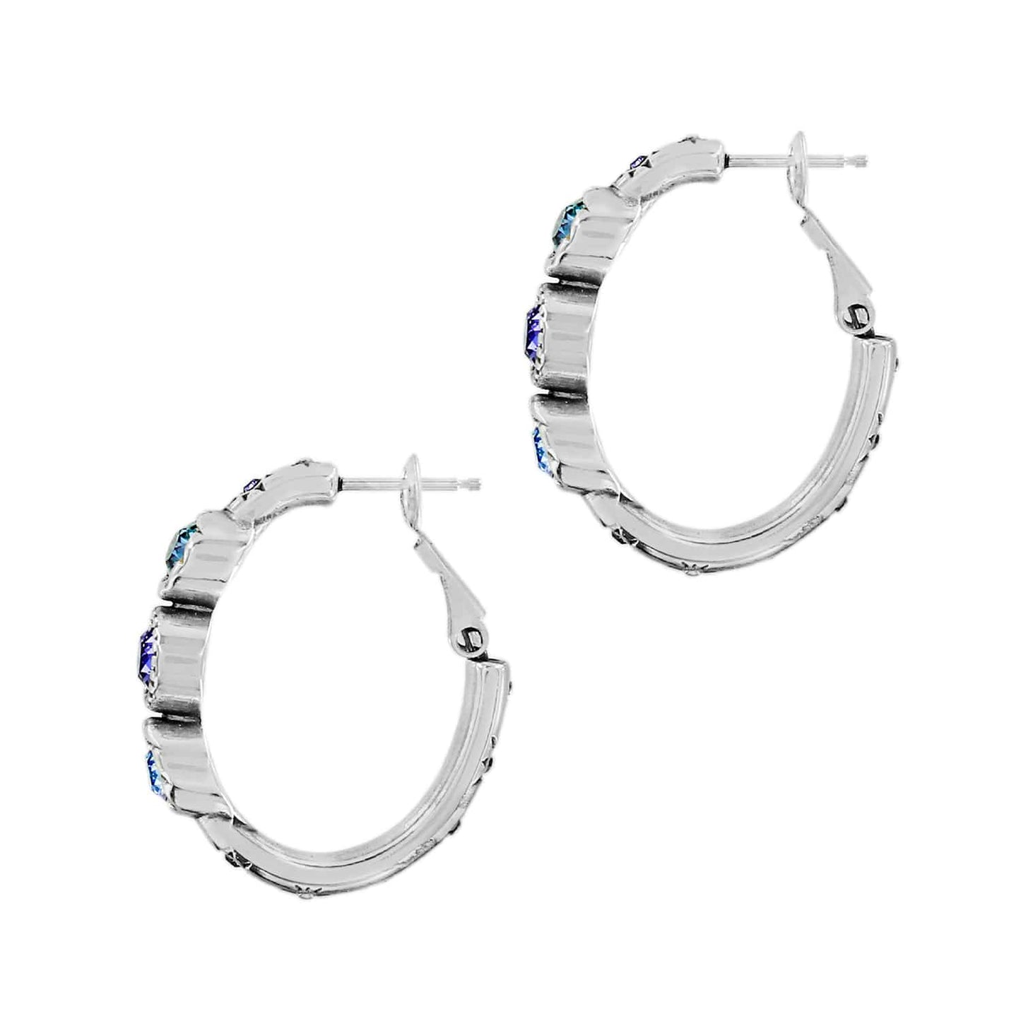 Brighton hoop earrings with silver-plated finish and blue crystal accents along the front on a white background