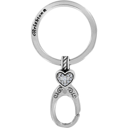 Brighton keychain with silver-plated ring, crystal heart accent, and scrollwork clip closure on a white background