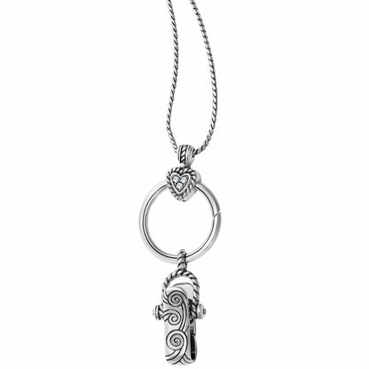 Brighton silver-plated charm holder necklace with heart crystal accent, round ring, and swirl-engraved clip on white background