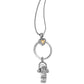 Brighton pendant necklace with silver-plated ring, gold heart accent, and engraved scroll charm on a white background