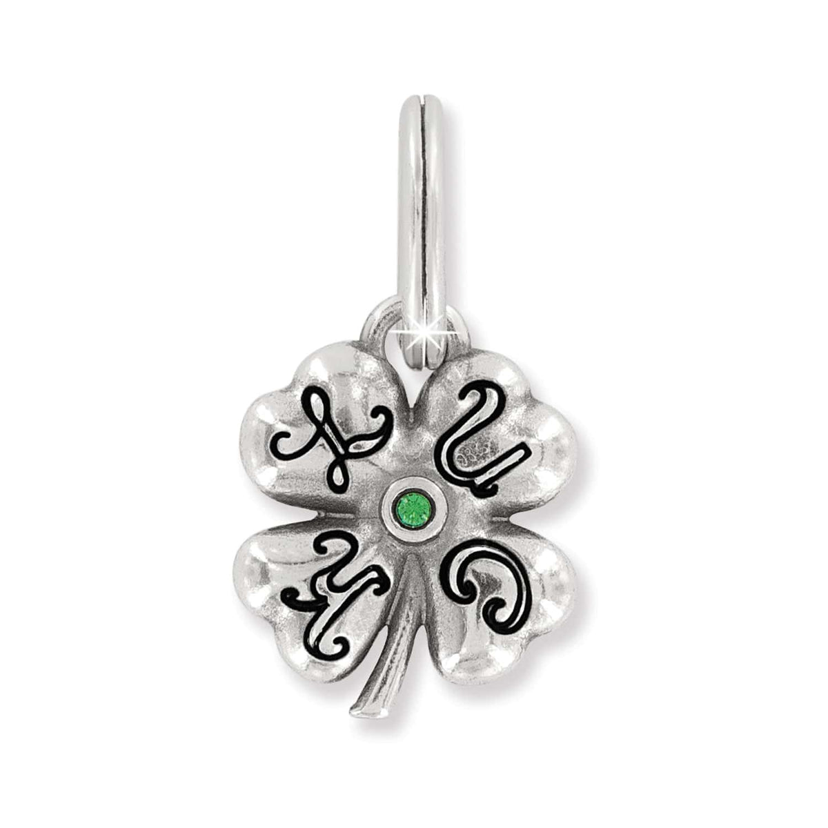 Brighton four-leaf clover charm with silver-plated finish, black enamel scrollwork, and green crystal center on a white background