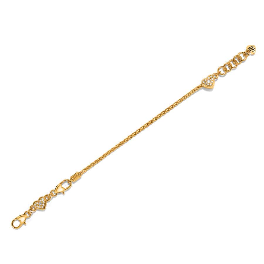 Heart Slide Bracelet in gold laid flat on a white background showing the heart design