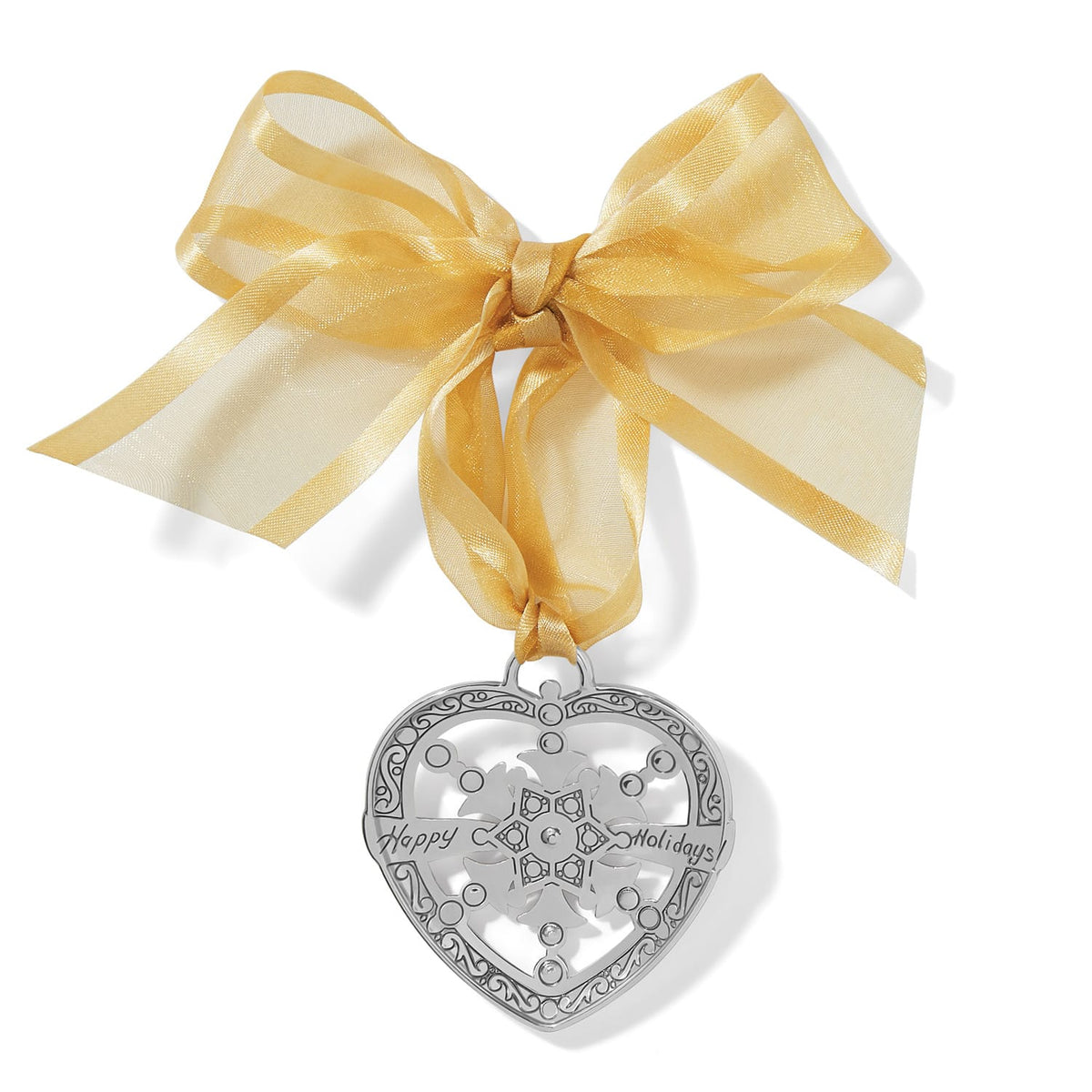 Brighton silver-plated heart ornament with snowflake cutout, Happy Holidays engraving, and gold organza ribbon on a white background