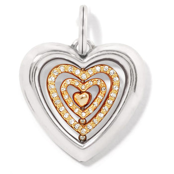 Brighton heart charm with silver-tone outer frame and gold-tone nested hearts with crystal accents on a white background