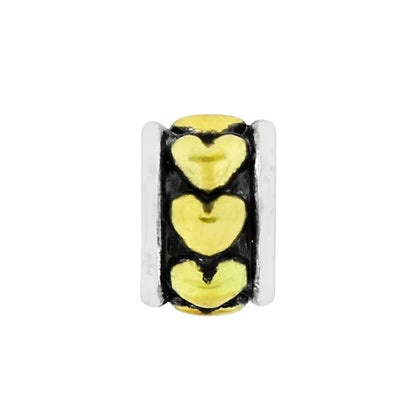 Brighton charm bead with three gold-tone hearts and silver-tone bordered edges on a white background