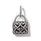 Brighton handbag-shaped charm with silver-plated scrollwork hearts over black enamel and beaded handle on a white background