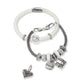 Brighton bracelets in silver-plated mesh and white enamel with crystal accents, friends charm, and heart charm on a white background