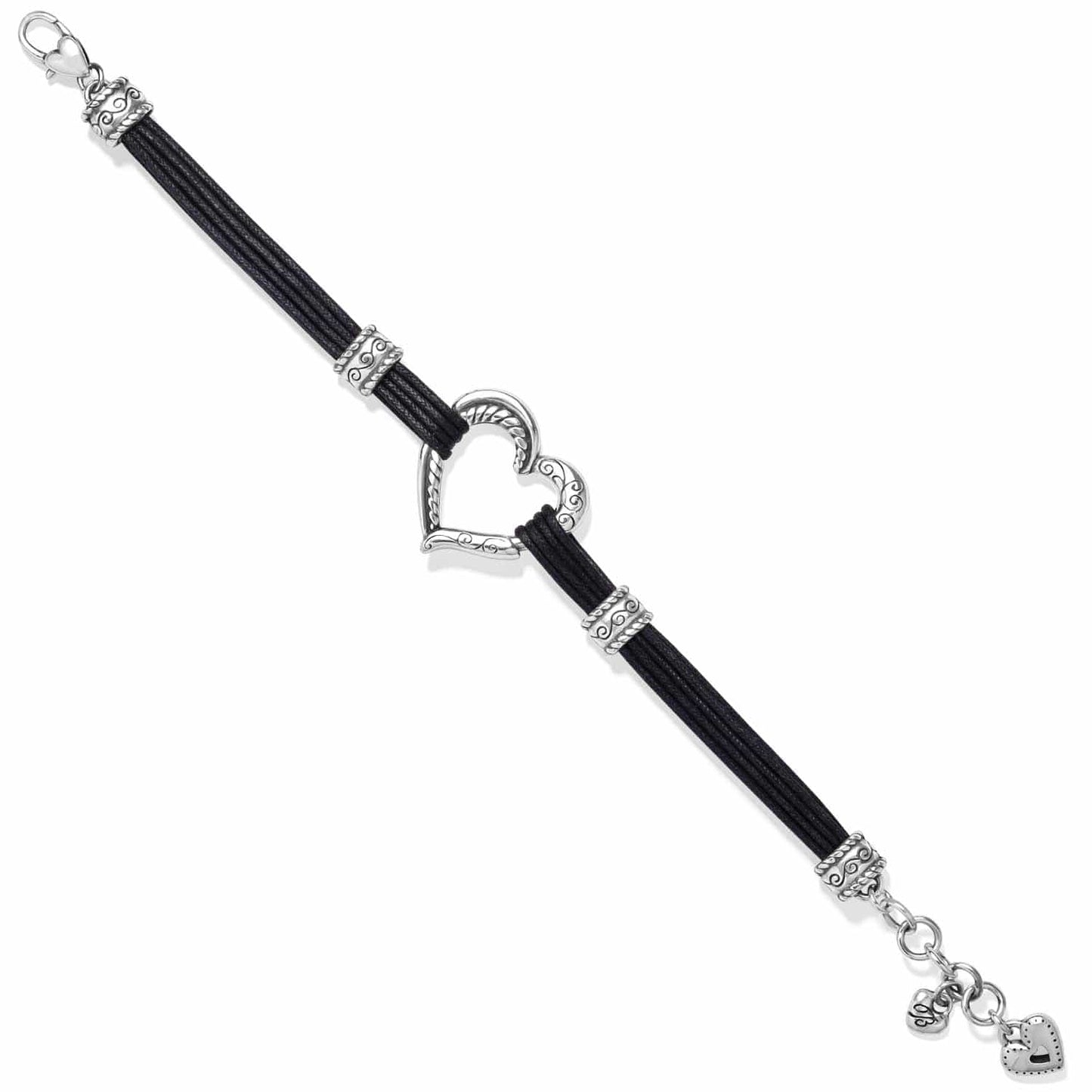 Brighton bracelet with black cords, silver-plated scrollwork stations, open heart centerpiece, and heart charm on a white background