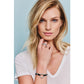Model wearing a Brighton black leather bracelet with silver-plated heart centerpiece paired with a silver-plated ring