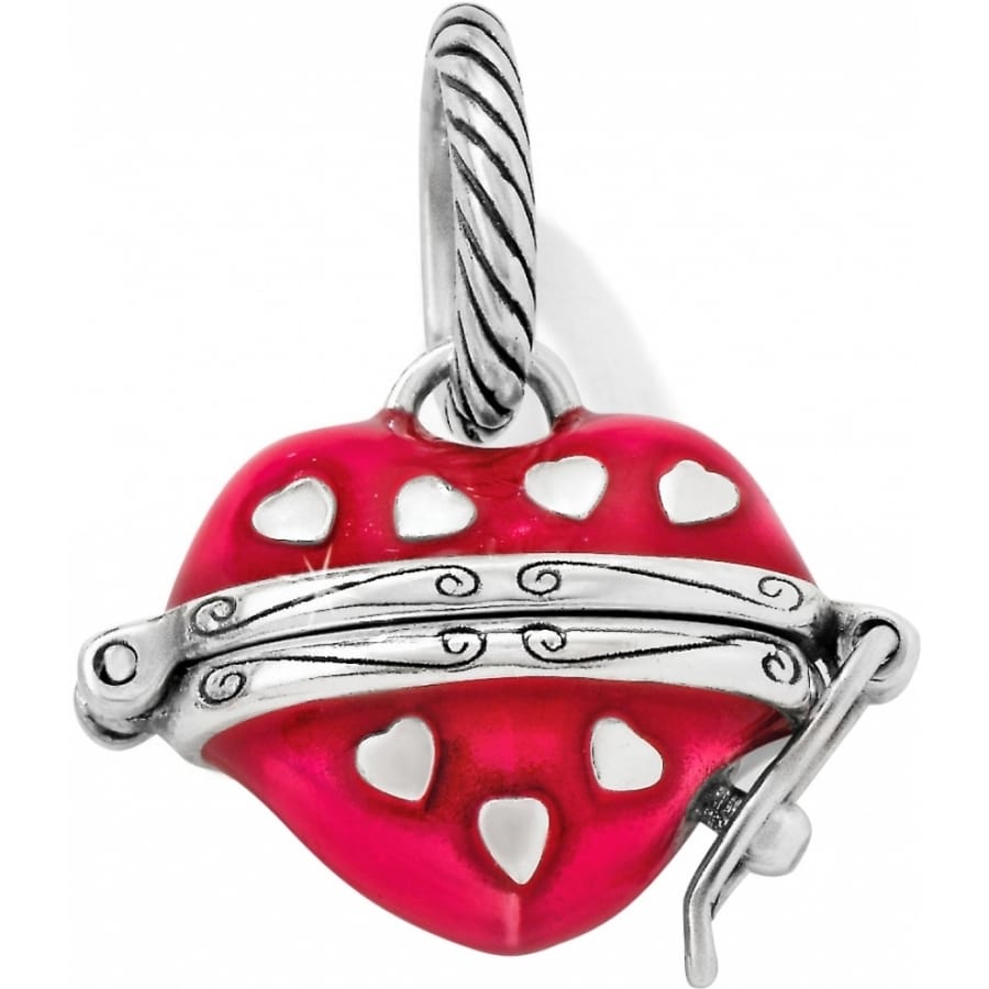 Brighton heart charm in pink enamel with silver-plated scroll band and cut-out heart details on a white background