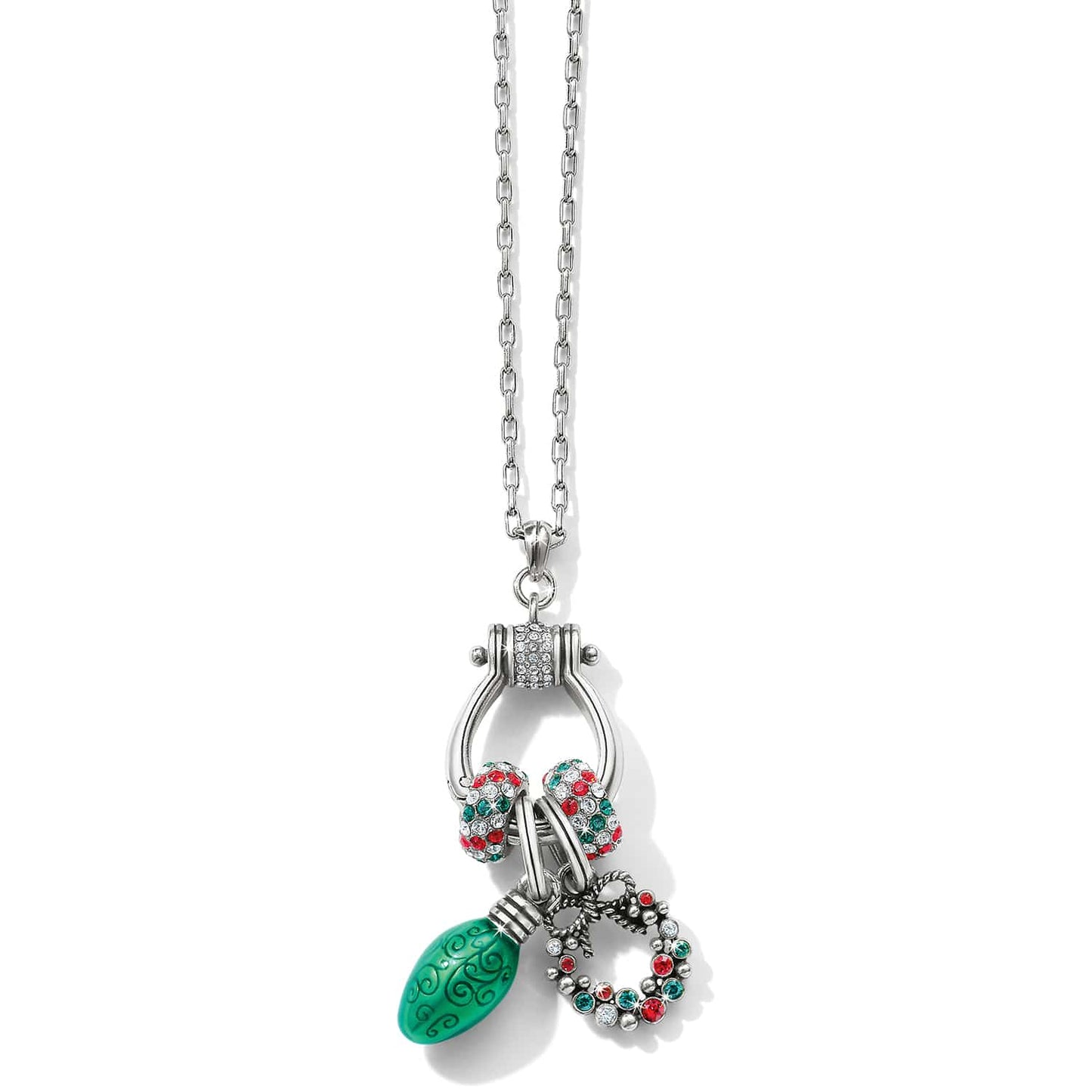 Brighton charm necklace with silver-plated ring holder, crystal beads, green enamel lightbulb, and wreath charm on a white background